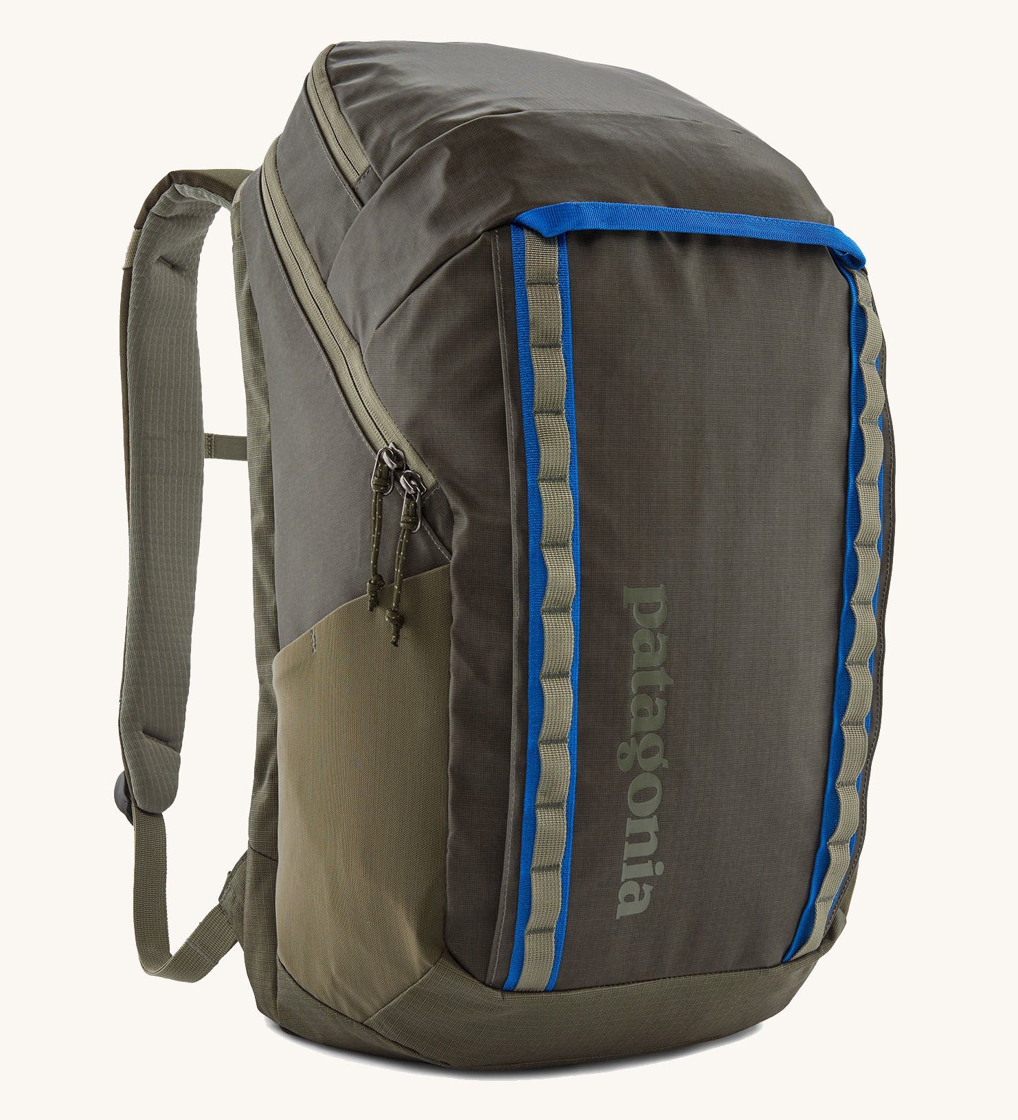 The Patagonia Black Hole Pack 32 litre capacity backpack in basin green with blue detailing.