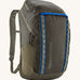 The Patagonia Black Hole Pack 32 litre capacity backpack in basin green with blue detailing.