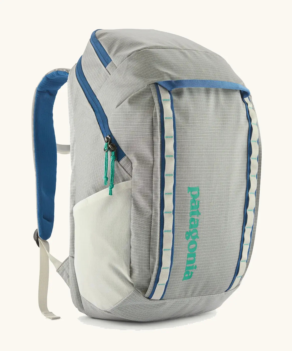 Patagonia black hole backpack 32L in light grey and blue trim with zipped compartment and mesh side pocket