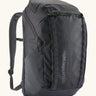 Patagonia 100% recycled polyester black hole 32 litre backpack in dark blue. Features padded shoulder straps, top compartment and mesh side pockets