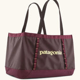 Patagonia weather resistant packable black hole 25 litre tote bag in berry fig. Features long carry handles