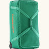 Patagonia black hole wheeled large capacity 100L duffel bag in bright green with matching straps and orange logo on front.