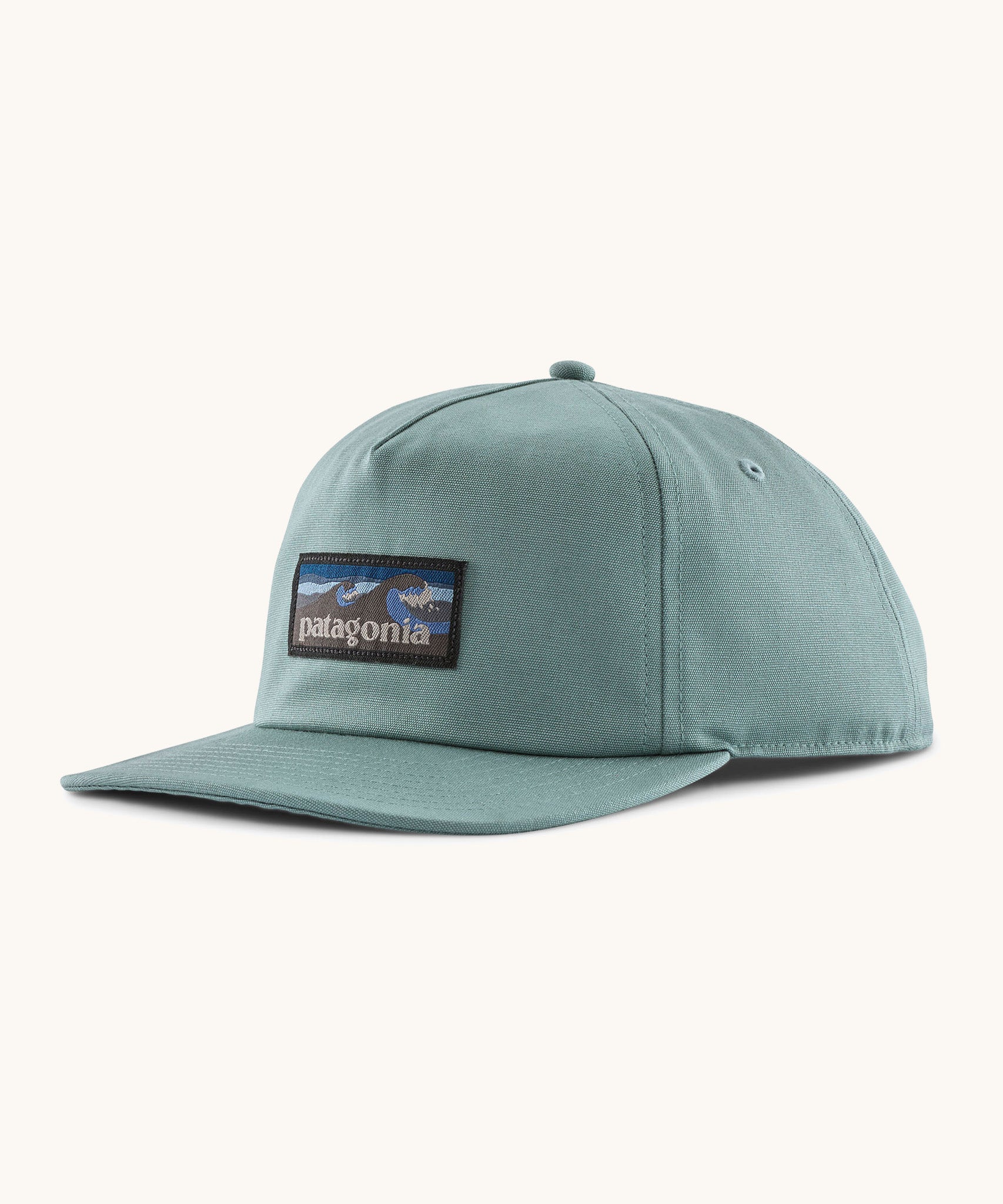 Patagonia boardshort label funfarer cap in sage blue with wave logo patch on front panel. 