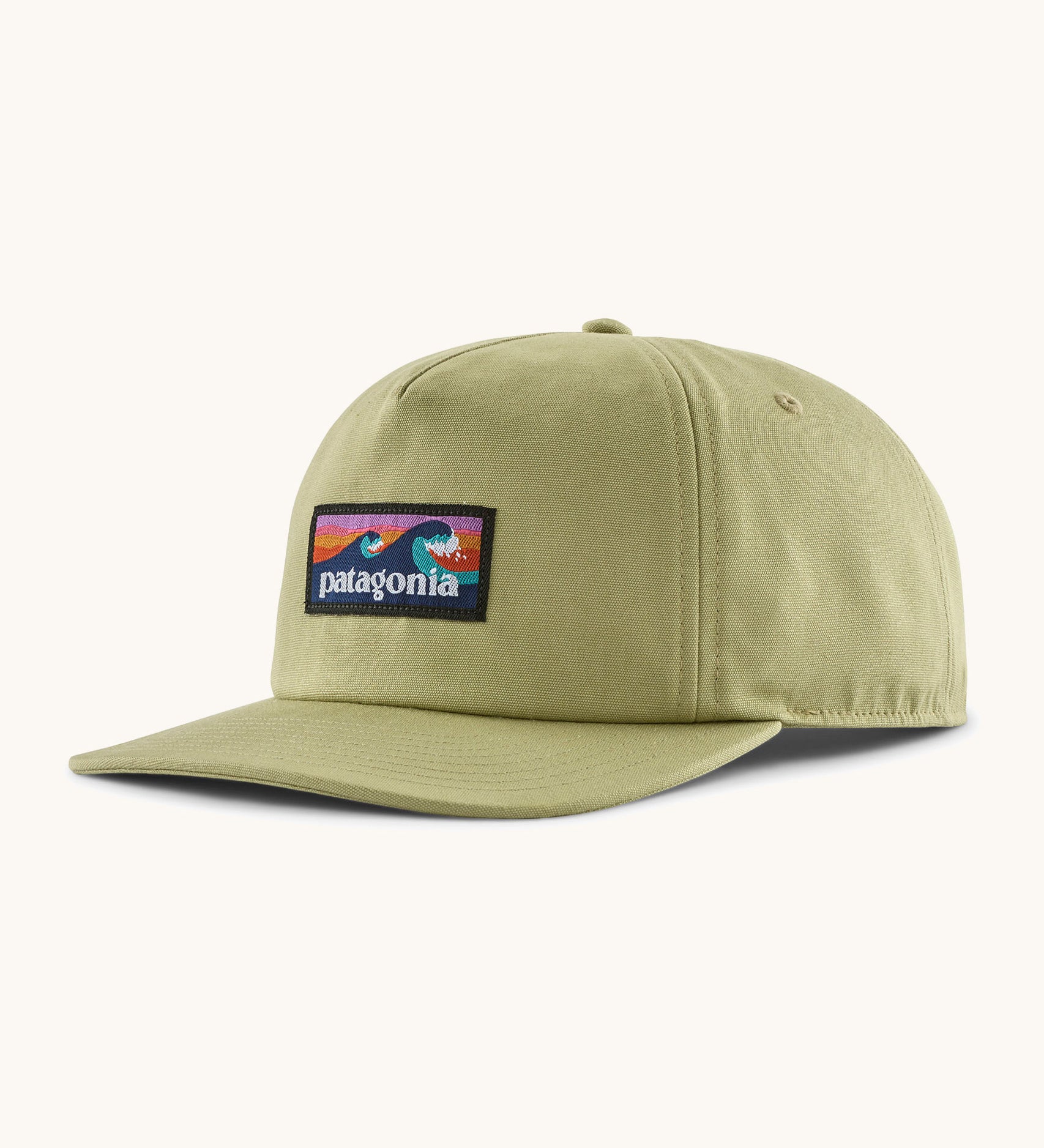 Patagonia boardshort label funfarer cap in light green with wave logo patch on front panel.