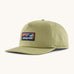 Patagonia boardshort label funfarer cap in light green with wave logo patch on front panel.
