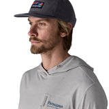 Man wearing Patagonia's boardshort label funfarer cap in black. Cap has a relaxed fit and sits above the ears