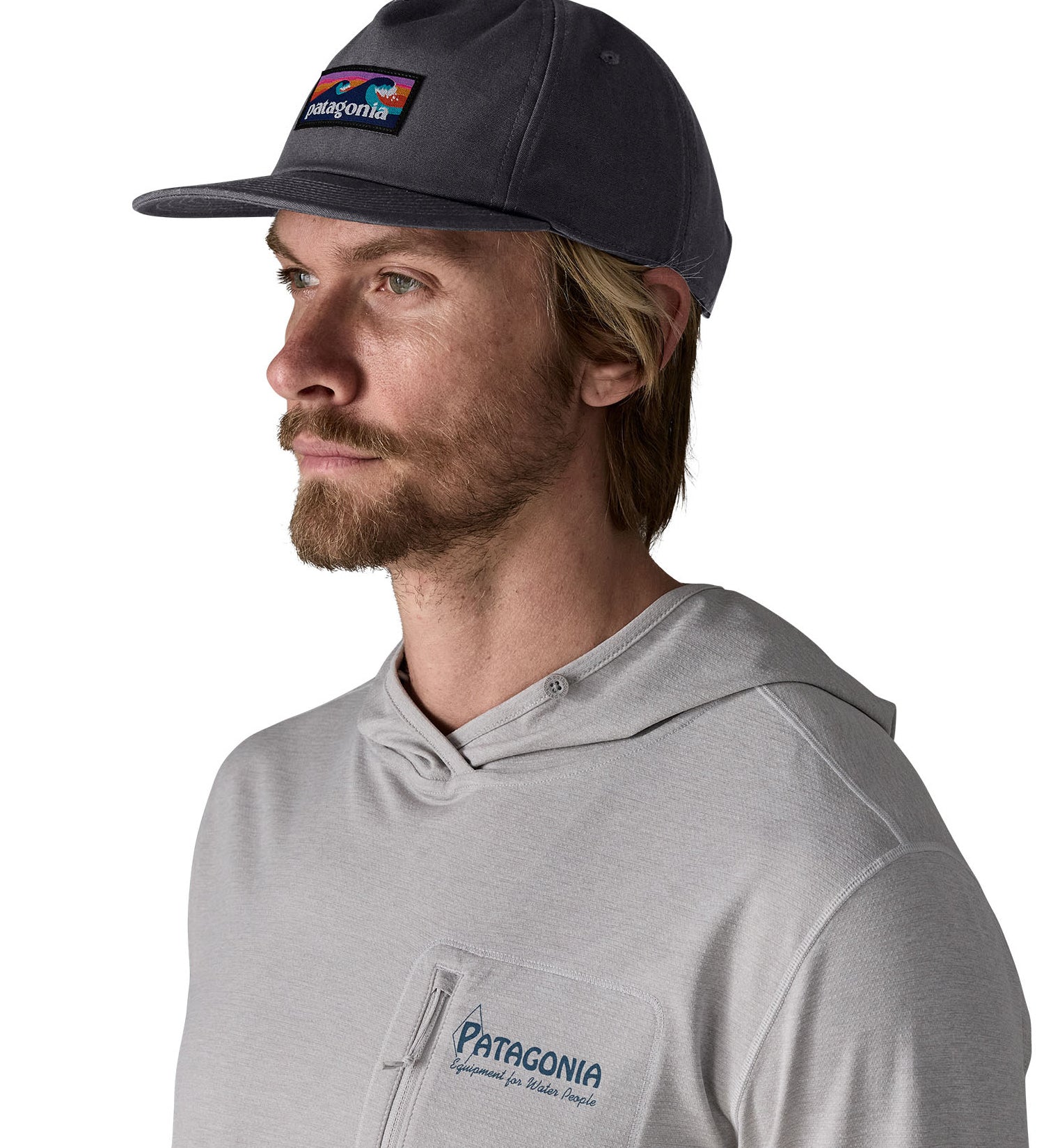 Man wearing Patagonia's boardshort label funfarer cap in black. Cap has a relaxed fit and sits above the ears