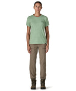 A woman wearing the Patagonia cool daily graphic short sleeve tshirt in ellwood green available at Babipur.