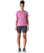 A woman wearing the Patagonia capilene cool daily graphic tshirt in 73 skyline brisk purple available at Babipur.