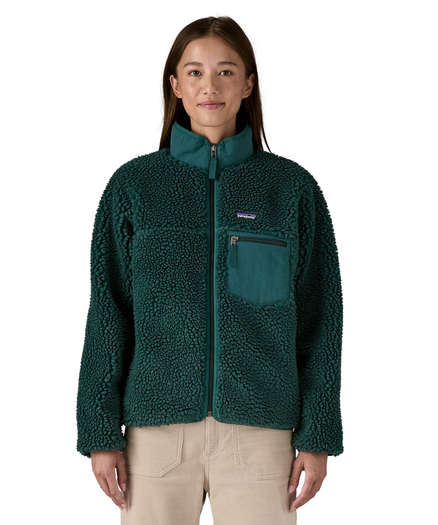 Patagonia classic retro x women's jacket in cascade green available at Babipur. A thick  warm teddy style fleece in dark green. Features a turn up collar, full length zip, 2 side pockets and a easy access chest pocket. 