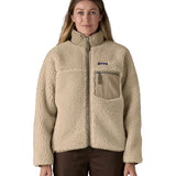 Patagonia classic retro x women's jacket in natural available at Babipur. A thick  warm teddy style fleece in a beige colour. Features a turn up collar, full length zip, 2 side pockets and a easy access chest pocket. 
