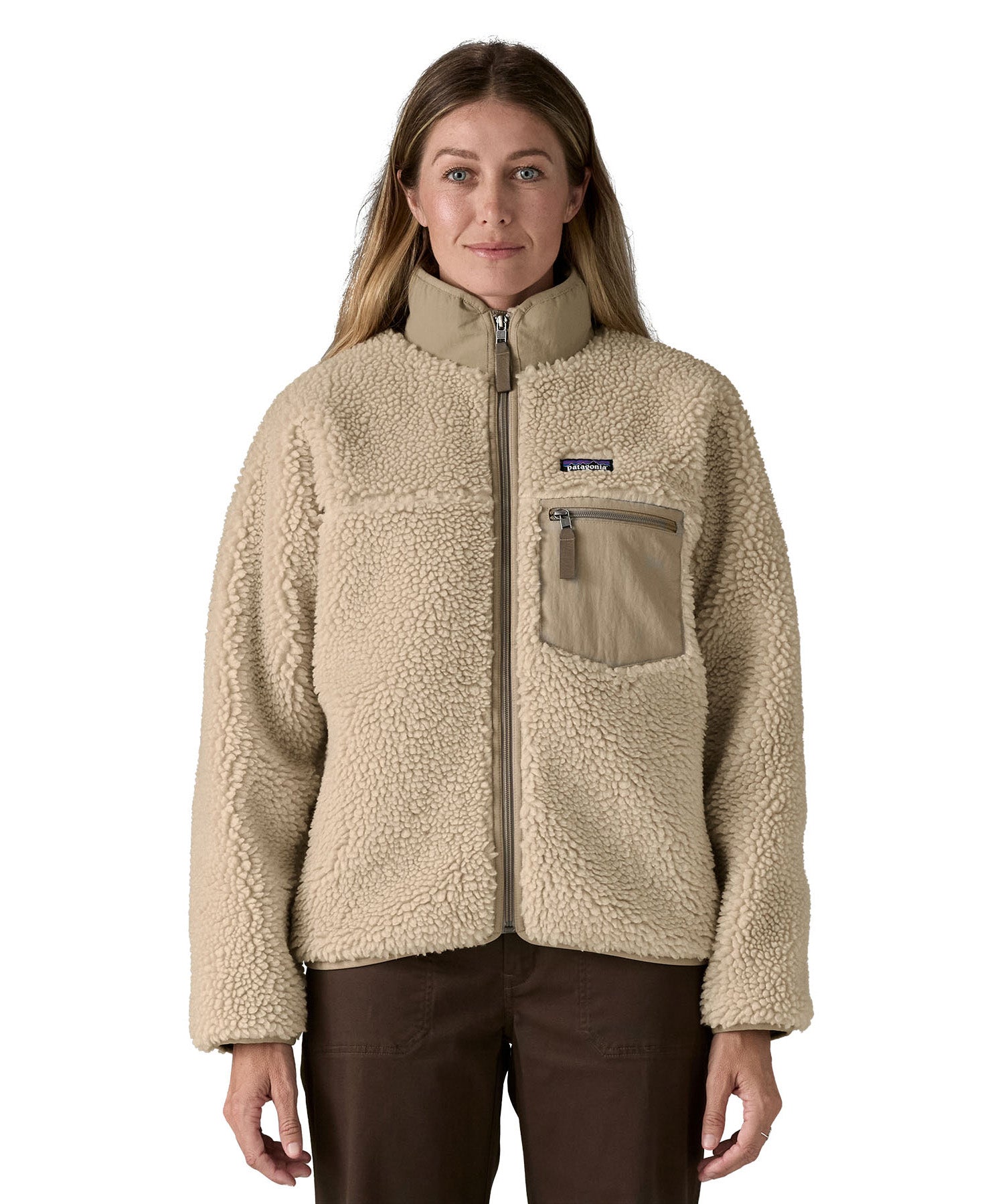 Patagonia classic retro x women's jacket in natural available at Babipur. A thick  warm teddy style fleece in a beige colour. Features a turn up collar, full length zip, 2 side pockets and a easy access chest pocket. 