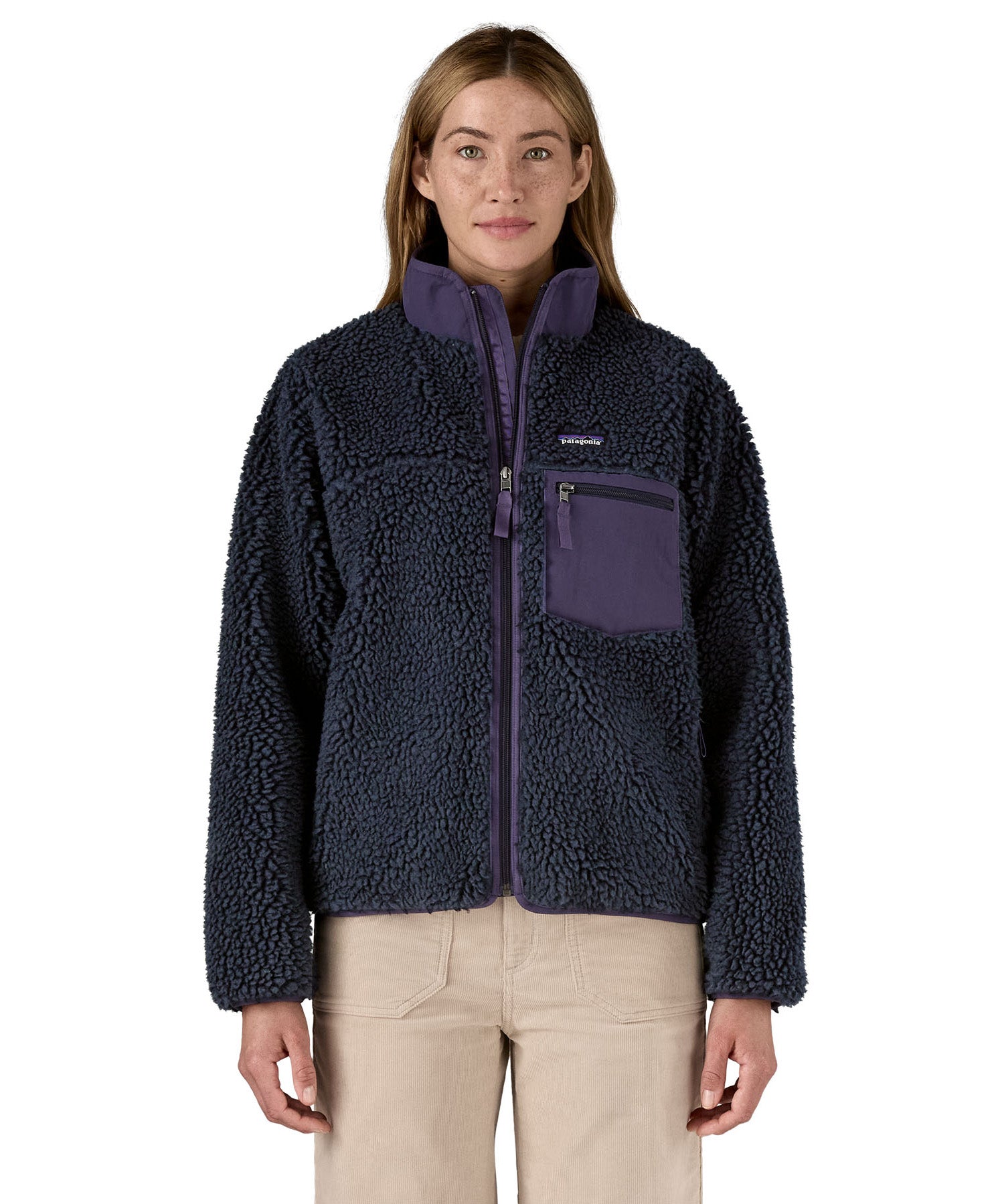 Patagonia classic retro x women's jacket in sunken blue available at Babipur. A thick  warm teddy style fleece in dark blue. Features a turn up collar, full length zip, 2 side pockets and a easy access chest pocket. 