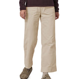 A person wearing the Patagonia Women's Wide Leg Cord Pants - Pumice, showing the flared style cut of the trouser legs