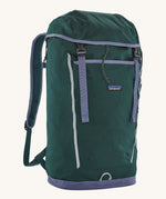 Patagonia lid fieldsmith lid backpack in cascade green. A 100% recycled material backpack in deep green and pale blue detail. Features a lid style top cover with buckle fastenings and padded shoulder straps