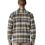The back of the Patagonia fjord flannel shirt in blizzard/salt grey available at Babipur worn by a man