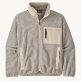 Patagonia Women's Synchilla Fleece Jacket - Oatmeal Heather. A light beige coloured zip up fleece with 3 pockets. One on the chest, and one each side of the jacket