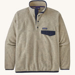 Patagonia Men's Synchilla Snap-T Fleece - Oatmeal Heather. A cream oatmeal coloured fleece with navy blue pocket flap, buttons and piping