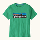 Patagonia organic cotton kids p6 logo short sleeve t-shirt in green with large brand patch on upper body