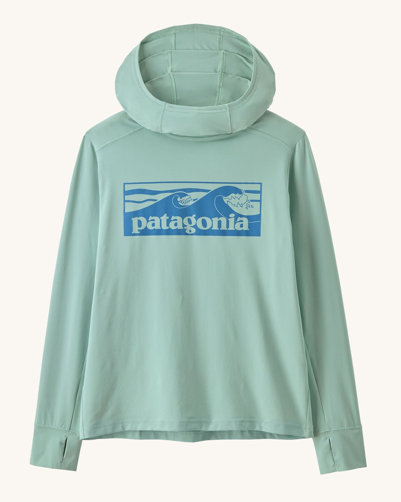 Patagonia kids capilene boardshort hoody in pastel green with blue brand graphic on upper body. Showing thumb holes