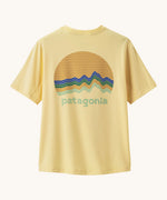 Patagonia recycled polyester kids capilene short sleeve t-shirt in yellow with large brand circular graphic on upper back