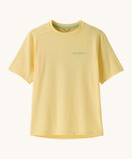 Patagonia recycled polyester kids capilene short sleeve t-shirt in yellow with light green brand text on chest. T-shirt has a regular fit