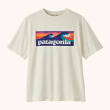 Patagonia recycled polyester kids capilene boardshort short sleeve t-shirt in white with brand patch on upper body. T-shirt has a regular fit
