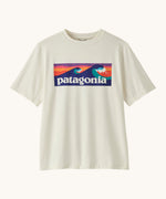 Patagonia recycled polyester kids capilene boardshort short sleeve t-shirt in white with brand patch on upper body. T-shirt has a regular fit