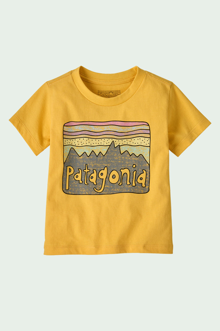 Patagonia Little Kids Regenerative T-Shirt - Fitz Roy Skies / Nectar Yellow - made from regenerative organic cotton with a large drawing of the Patagonia logo on the front.