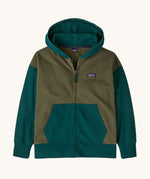 Patagonia kids full zip hoody sweatshirt in basin green. A 100% regenerative cotton hoody in green and khaki with a brand patch graphic on the chest. Features a full length zip and pouch side pockets.