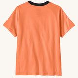 Back of Patagonia kids organic cotton short sleeve tidal threads t-shirt in peach orange with black collar trim. 