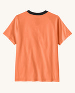Back of Patagonia kids organic cotton short sleeve tidal threads t-shirt in peach orange with black collar trim. 