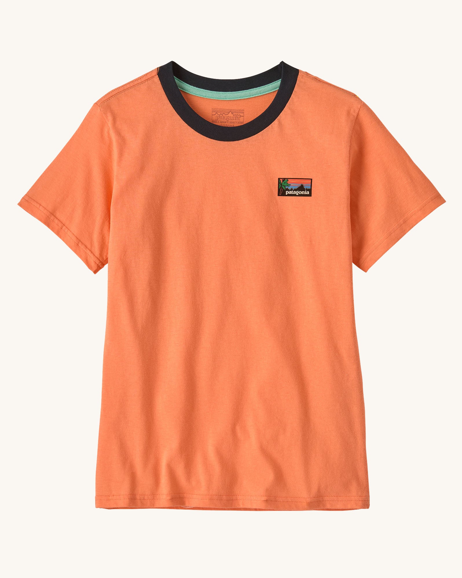 Patagonia kids short sleeve tidal threads t-shirt in peach orange with black collar trim and small chest brand patch