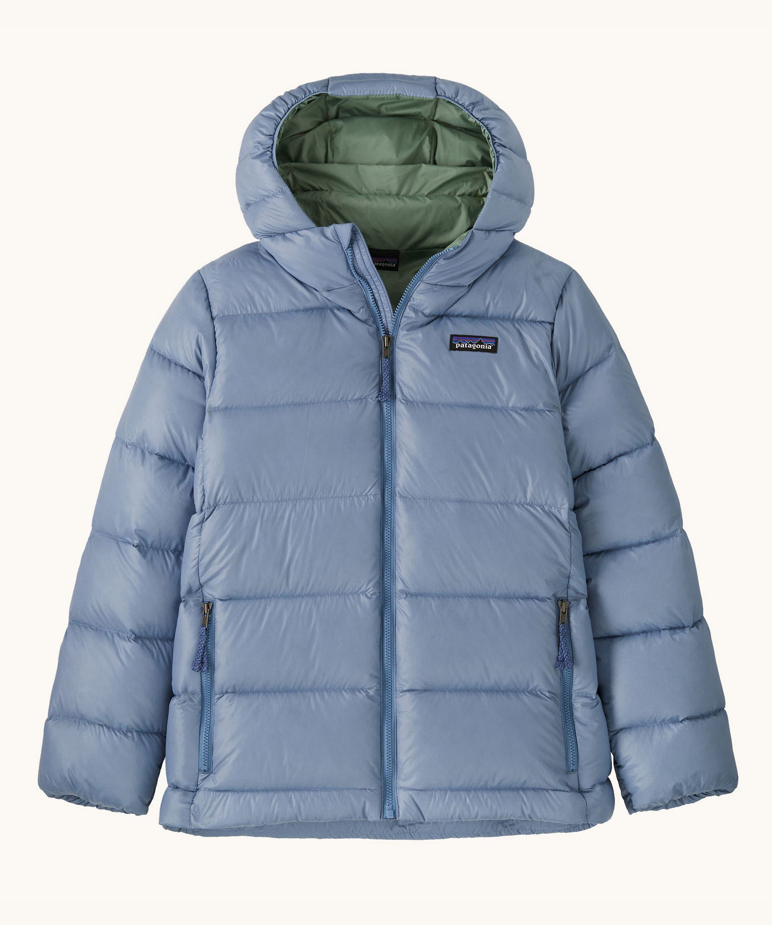 Patagonia kids hi loft down sweater hoody jacket in barnacle blue available at Babipur. A thick light blue hooded jacket with a full length zip and 2 side pockets.