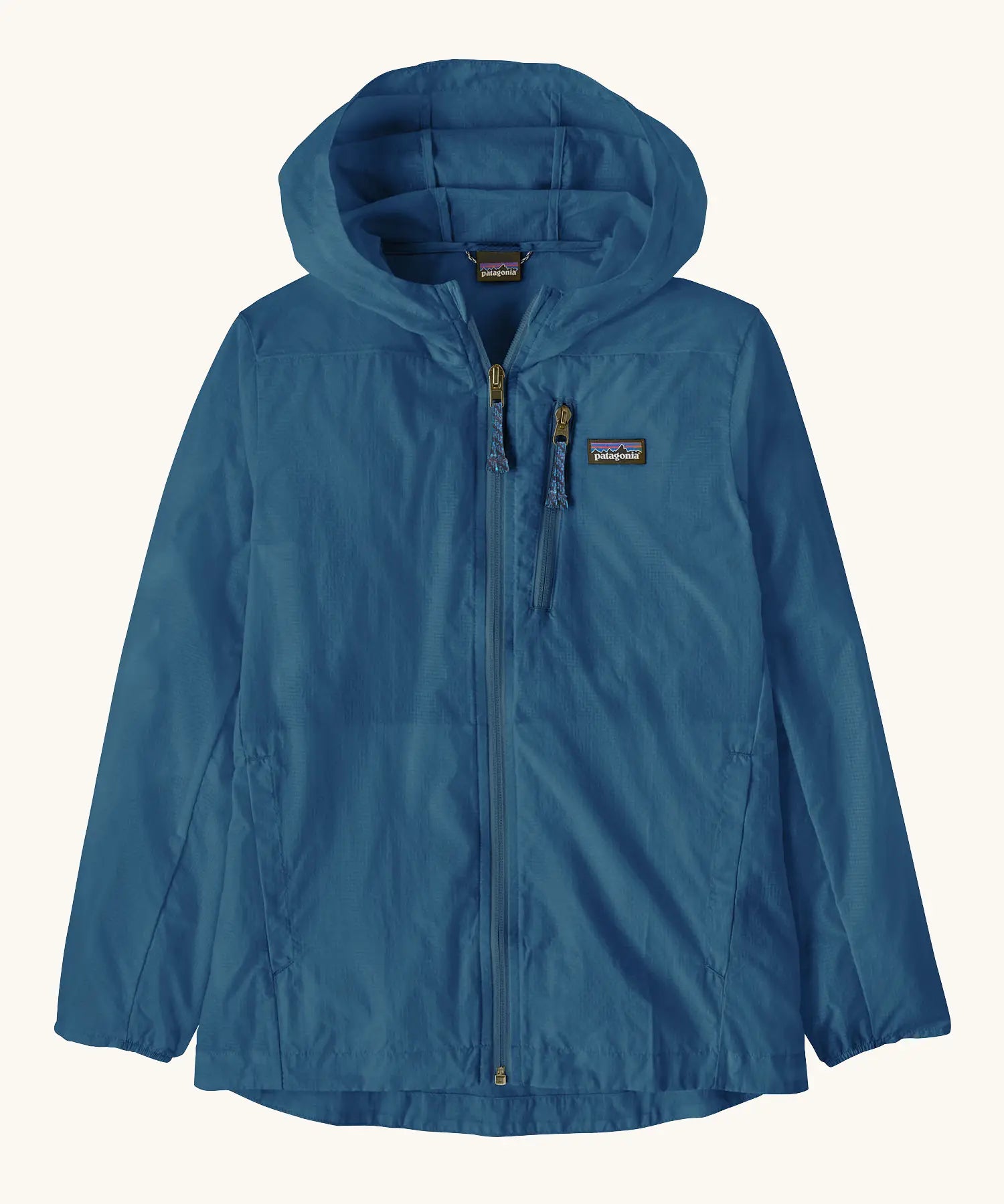 Patagonia's 100% recycled nylon kids houdini jacket in blue with full length front zip, side and zipped chest pocket