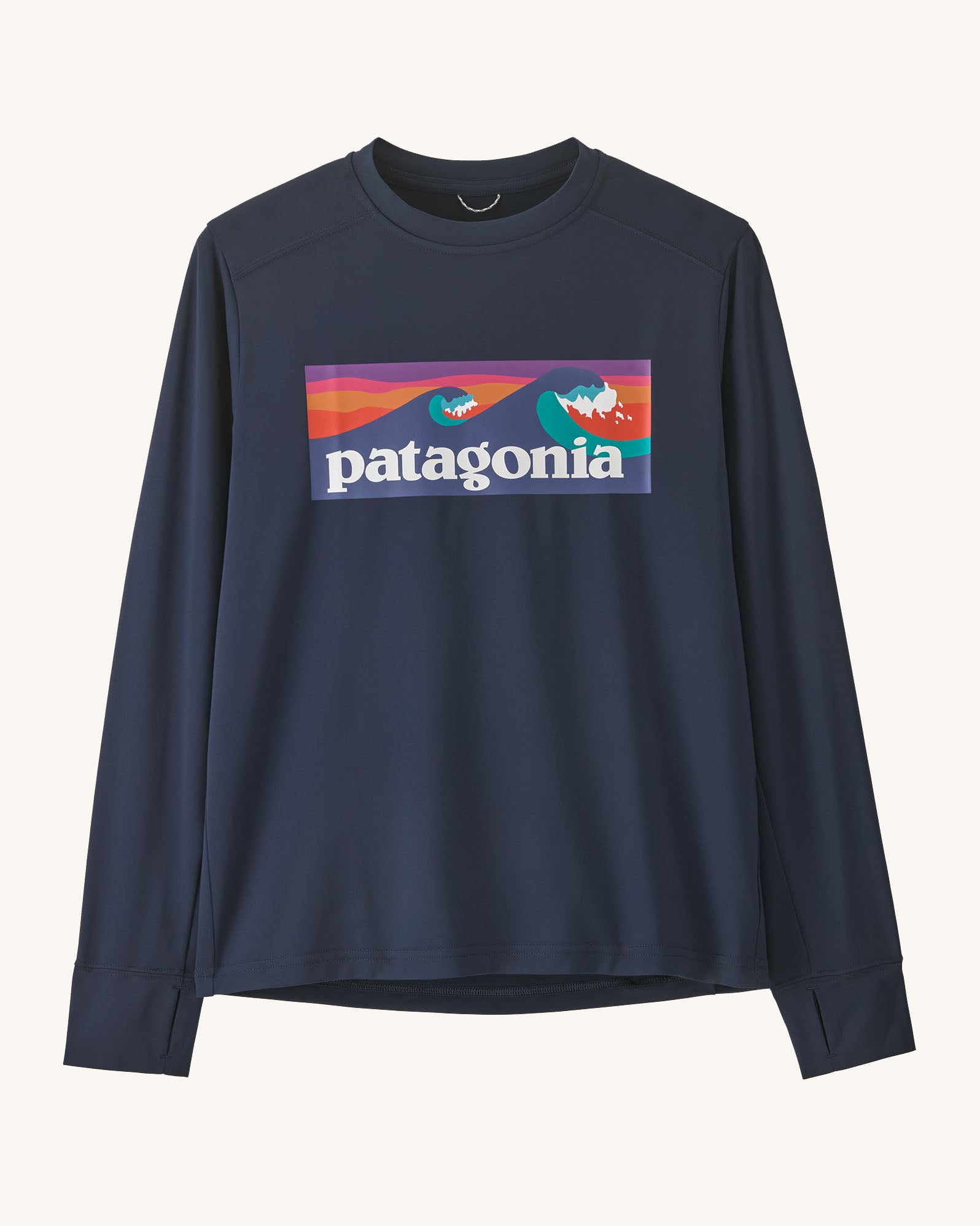 Patagonia kids long sleeve capilene boardshort tshirt in navy with brand patch on upper body and thumb holes