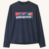 Patagonia kids long sleeve capilene boardshort tshirt in navy with brand patch on upper body and thumb holes