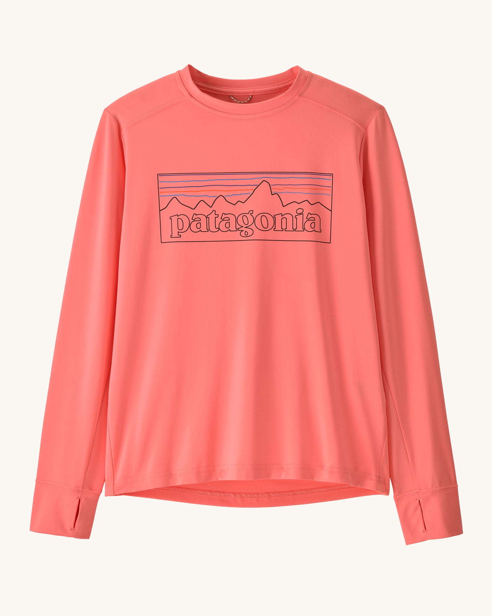 Patagonia kids long sleeve capilene tshirt in pink with outline brand patch on upper body and thumb holes