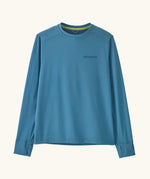 Patagonia kids long sleeve capilene tshirt in bright blue with brand patch on chest