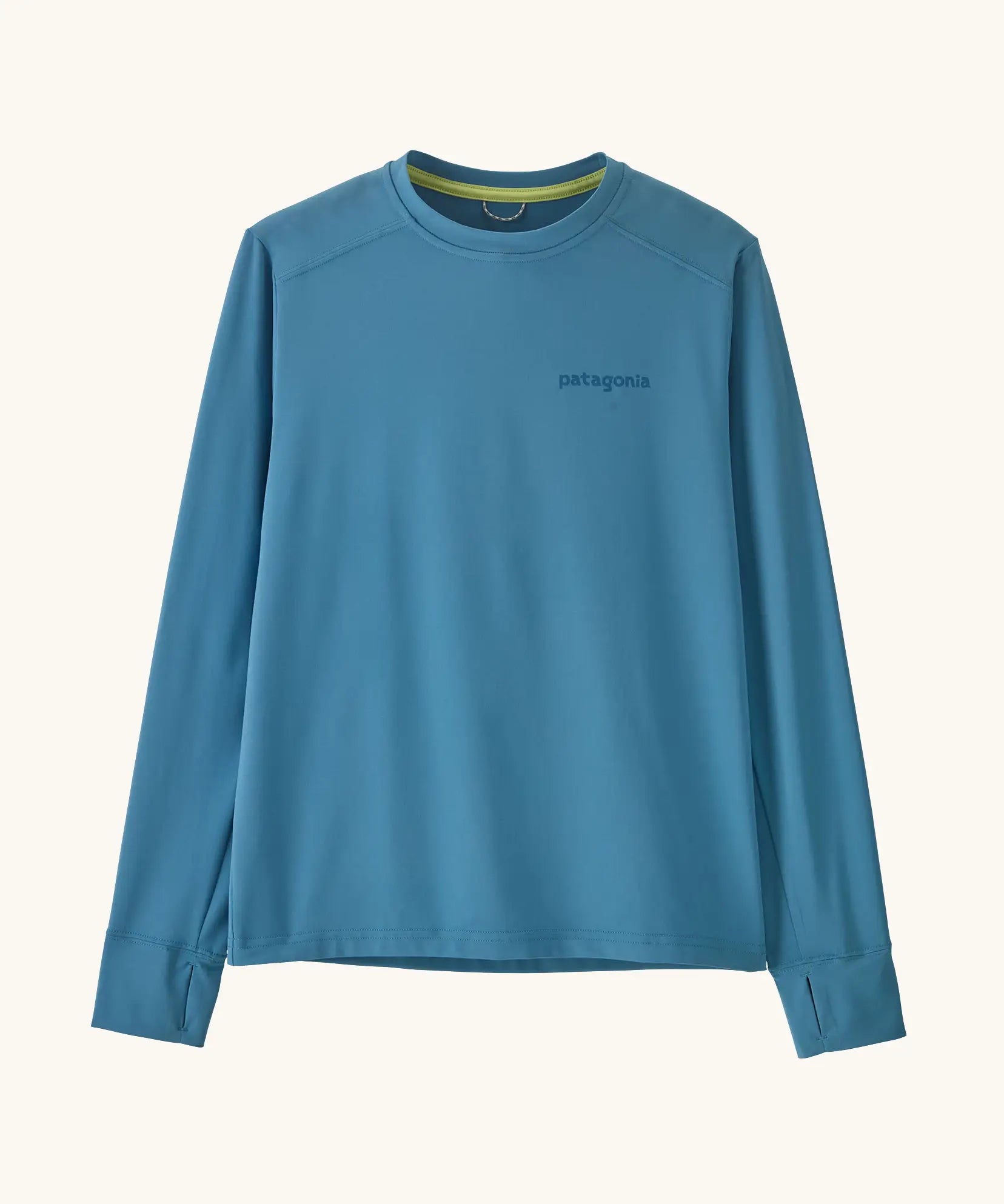 Patagonia kids long sleeve capilene tshirt in bright blue with brand patch on chest