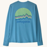 Patagonia kids long sleeve capilene tshirt in bright blue with circular brand patch on upper back 