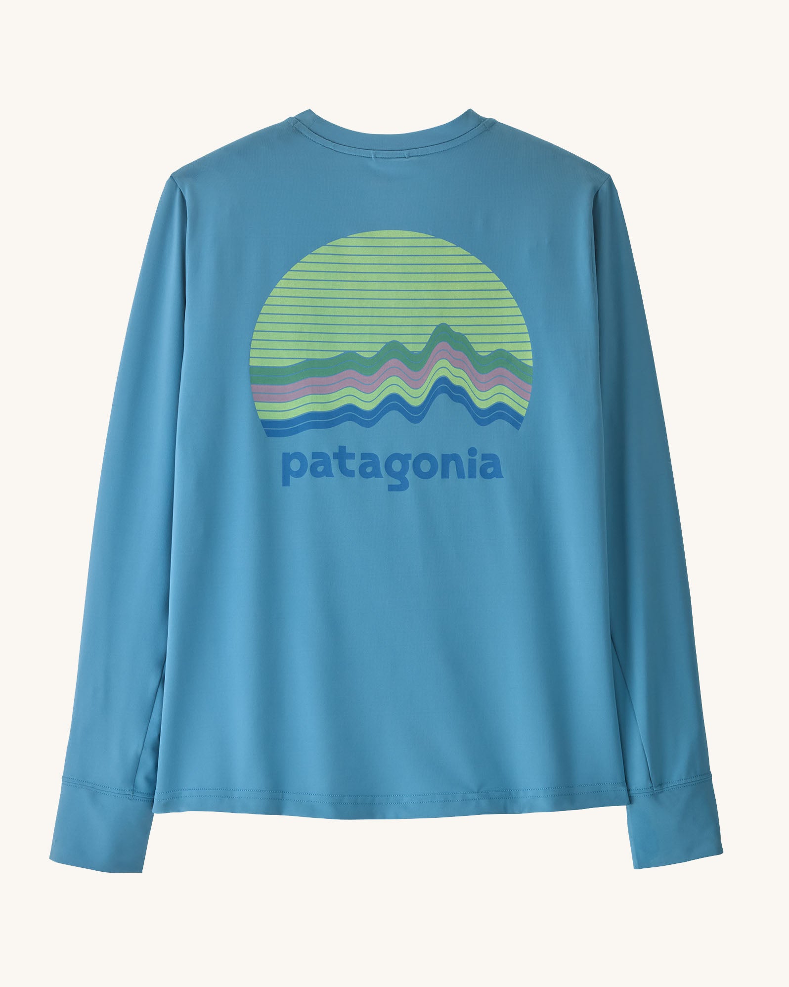 Patagonia kids long sleeve capilene tshirt in bright blue with circular brand patch on upper back 