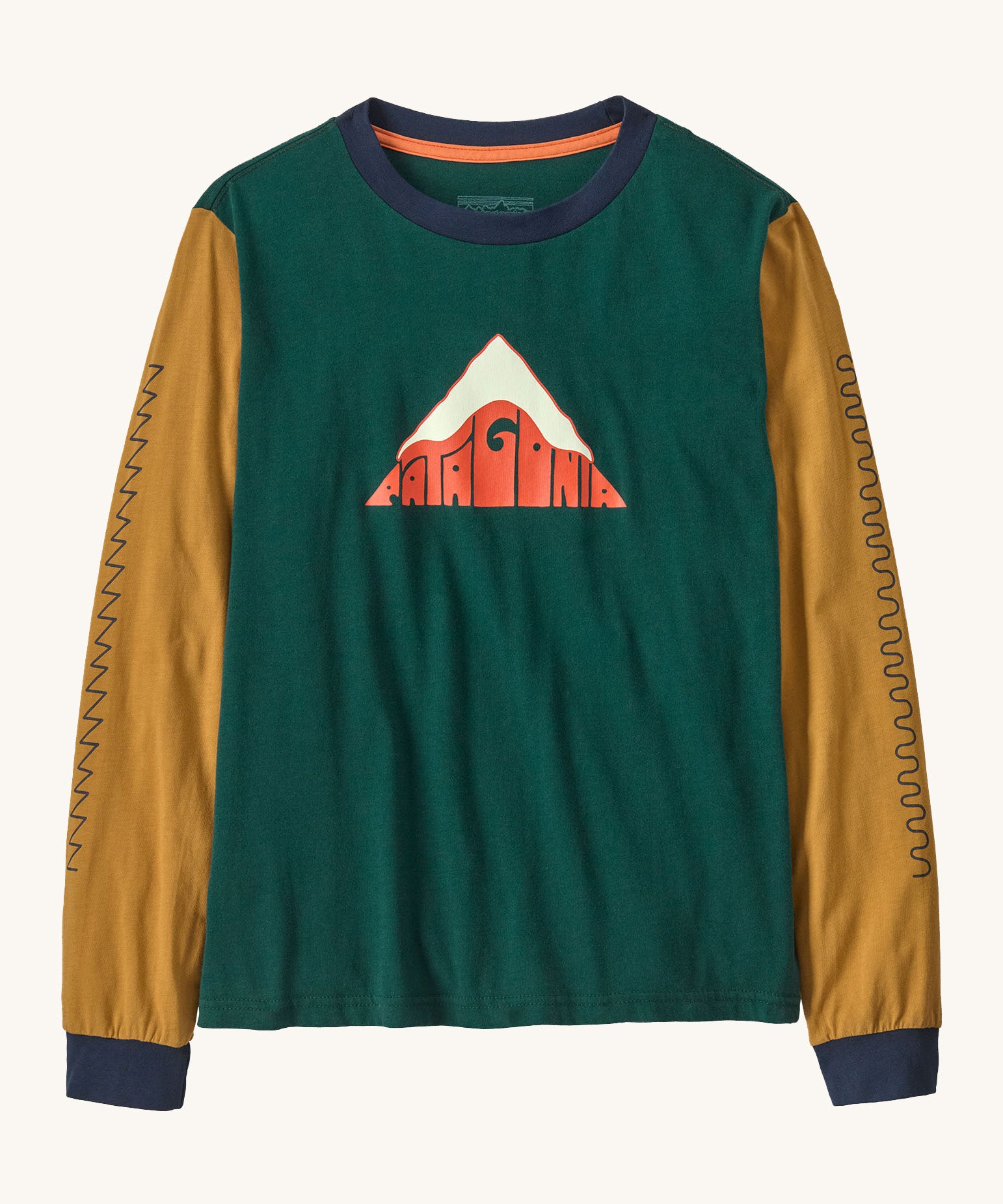 Patagonia kids long sleeve graphic top in driftways/cascade green available at Babipur.. A 100% regenerative cotton top with long sleeves in green and dark yellow with navy trim. Features a mountain logo design on the front.