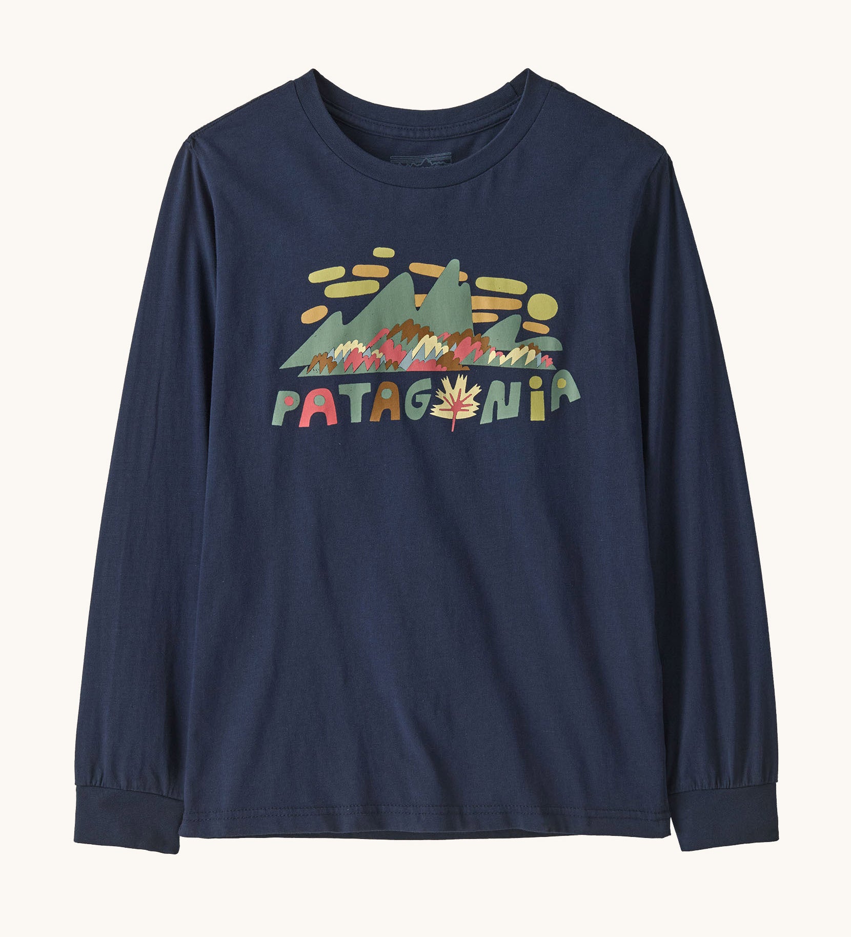 Patagonia kids long sleeve graphic top in fitz roy foliage/navy available at Babipur.. A 100% regenerative cotton top with long sleeves in navy. Features a funky mountain branding design on the front.