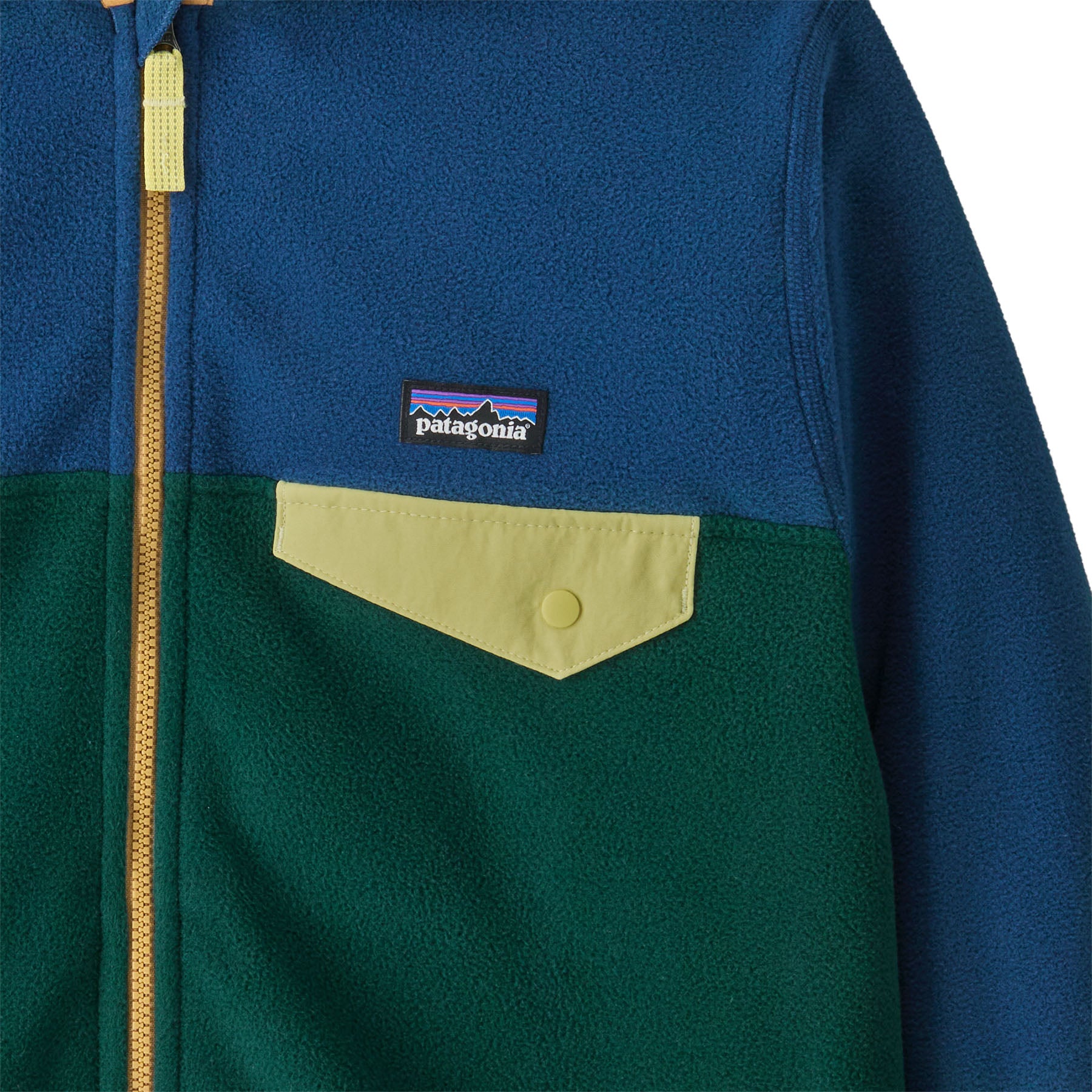 Patagonia kids micro d snap t fleece in cascade green available at Babipur showing the chest pocket detail