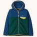 Patagonia kids micro d snap t fleece in cascade green available at Babipur.  100% recycled polyester soft hooded fleece in dark blue and green with yellow rim. Features a full length zip and a yellow chest pocket