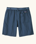 Patagonia kid's outdoor everyday 6 inch shorts in dark blue showing a back pocket with velcro tab