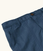 Close up of the elasticated waistband on the Patagonia kid's outdoor everyday 6 inch shorts in dark blue 