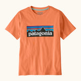 Patagonia organic cotton kids p6 logo short sleeve t-shirt in orange with large brand patch on upper body