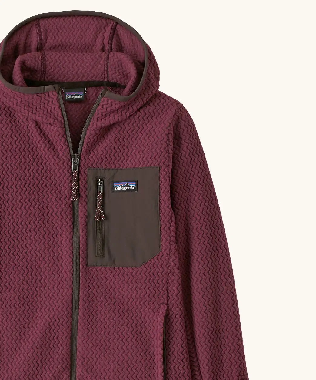 Patagonia Kids’ R1 Air Full-Zip Hoody in maroon showing close up of chest pocket and full front zip detail